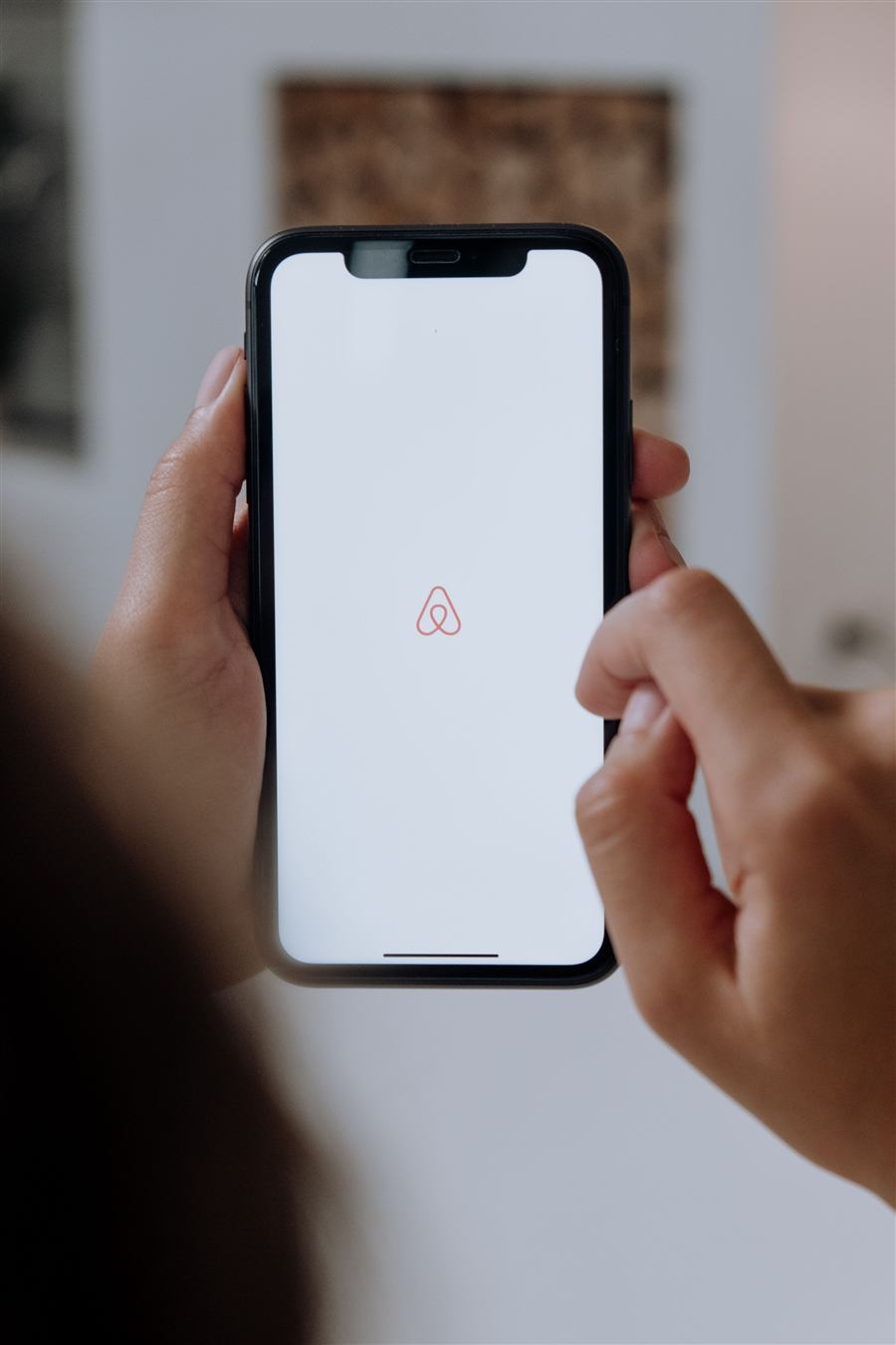 Host managing a booking and reporting an issue from their phone