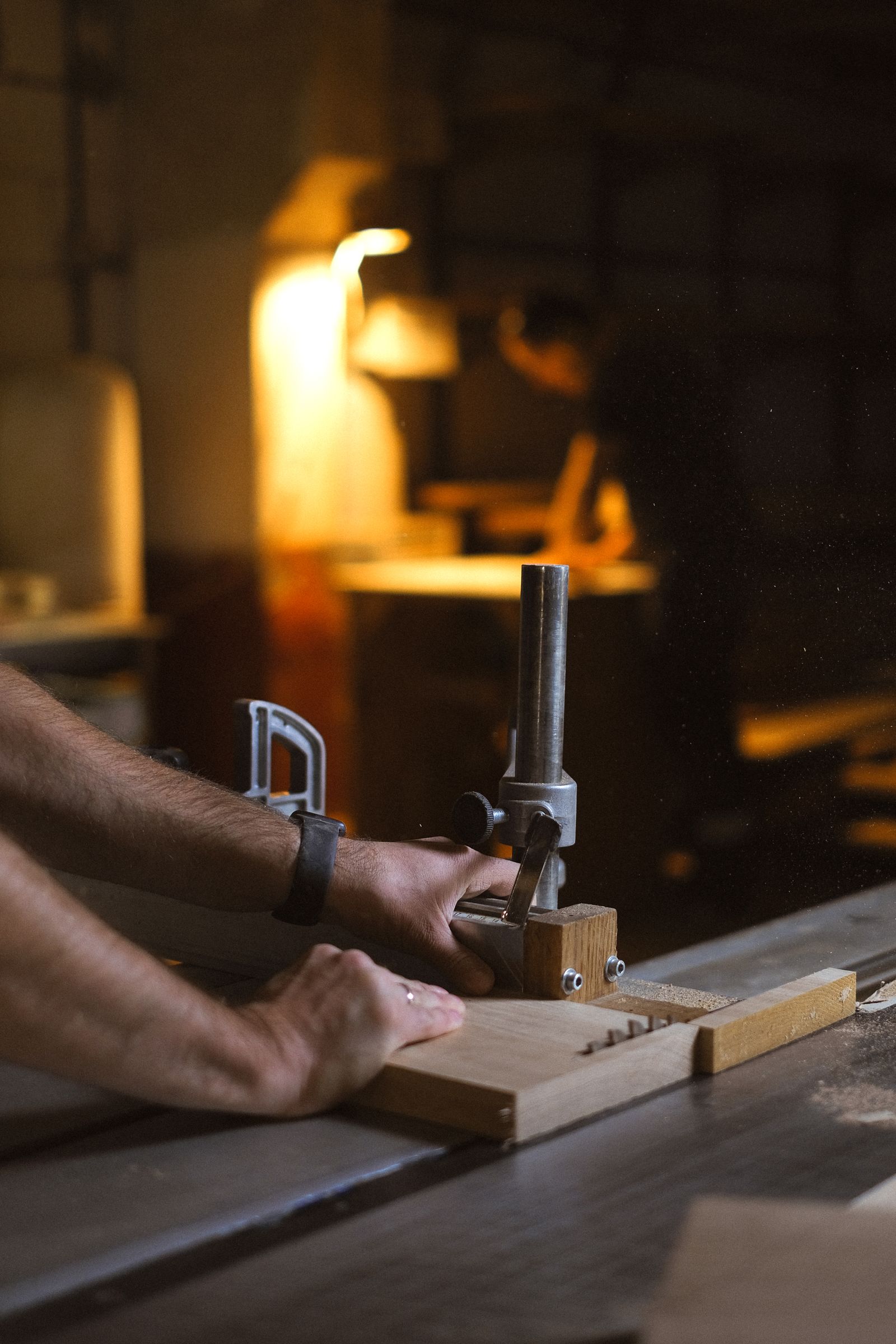 Carpenter working with timber in a workshop