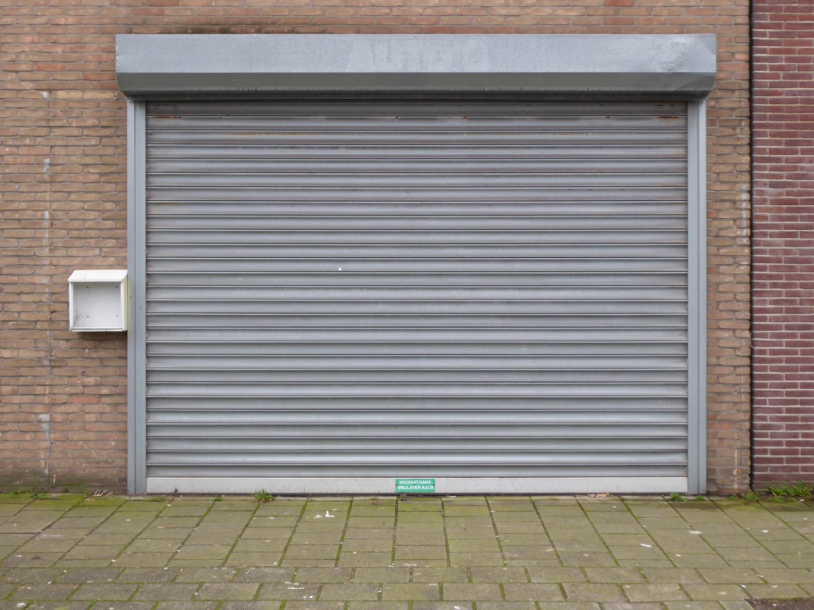 Suburban house with double garage door